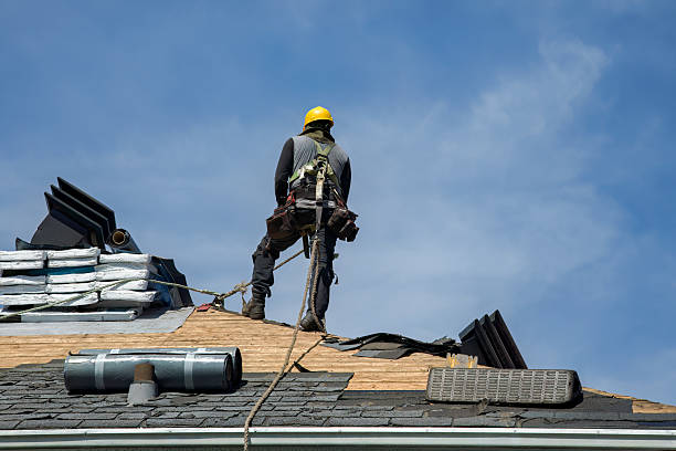 Professional Roof Replacement technician working in Saint Albans, NY